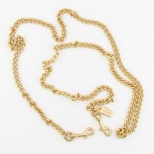 Coach Gold‑Tone Strap Extender With Logo Tag